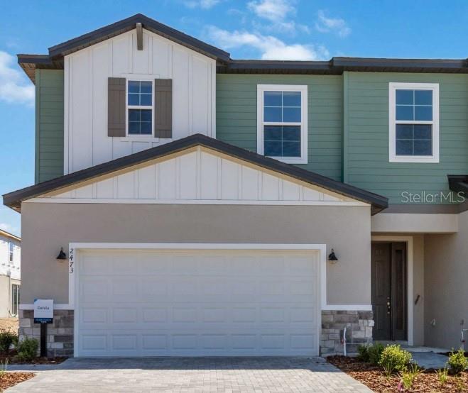 Under Construction. Discover The Dahlia at Magnolia Reserve in Ocoee, FL! This stunning end-unit townhome was designed with today’s lifestyle in mind—modern, stylish, and effortlessly functional. Featuring 3 bedrooms, 2.5 bathrooms, and a flexible loft, it’s the perfect space to relax, entertain, and make your own. Step inside to a bright, open layout with gorgeous luxury vinyl plank flooring that adds warmth and flow throughout the first floor. The designer kitchen shines with 42” white shaker cabinets, quartz countertops, soft-close drawers, and stainless-steel appliances, making it as beautiful as it is functional. Upstairs, unwind in your spacious primary suite with a walk-in closet and spa-style bath featuring 12x24 tile and dual vanities. Two secondary bedrooms, a versatile loft, and a convenient laundry room complete the upstairs retreat. Outside, enjoy a private patio and a 2-car garage with paved driveway. And with only 48 townhomes available, Magnolia Reserve is an exclusive opportunity you don’t want to miss! Perfectly located right off the West Orange Trail and minutes from Winter Garden and SR 429, Magnolia Reserve blends modern townhome living with unbeatable convenience. Don’t wait—The Dahlia is your chance to own style, comfort, and location all in one! DISCLAIMER: Photos and/or drawings of homes may show upgraded landscaping, elevations and optional features that may not represent the lowest priced homes in the community. Pricing, Incentives and Promotions are subject to change at anytime. Promotions cannot be combined with any other offer. Ask the Sales and Marketing Representative for details on promotions.