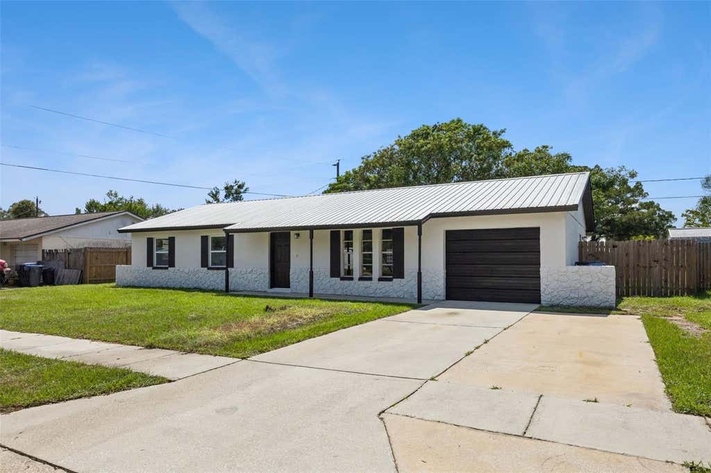 Photo of 1660 Ashwood Avenue, Titusville, FL 32796 (MLS # O6434432)