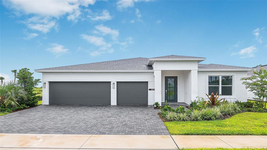Photo of 1613 Bellagio Loop, Tavares, FL 32778 (MLS # W7880656)