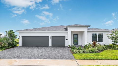 Photo of 1613 Bellagio Loop, Tavares, FL 32778 (MLS # W7880656)
