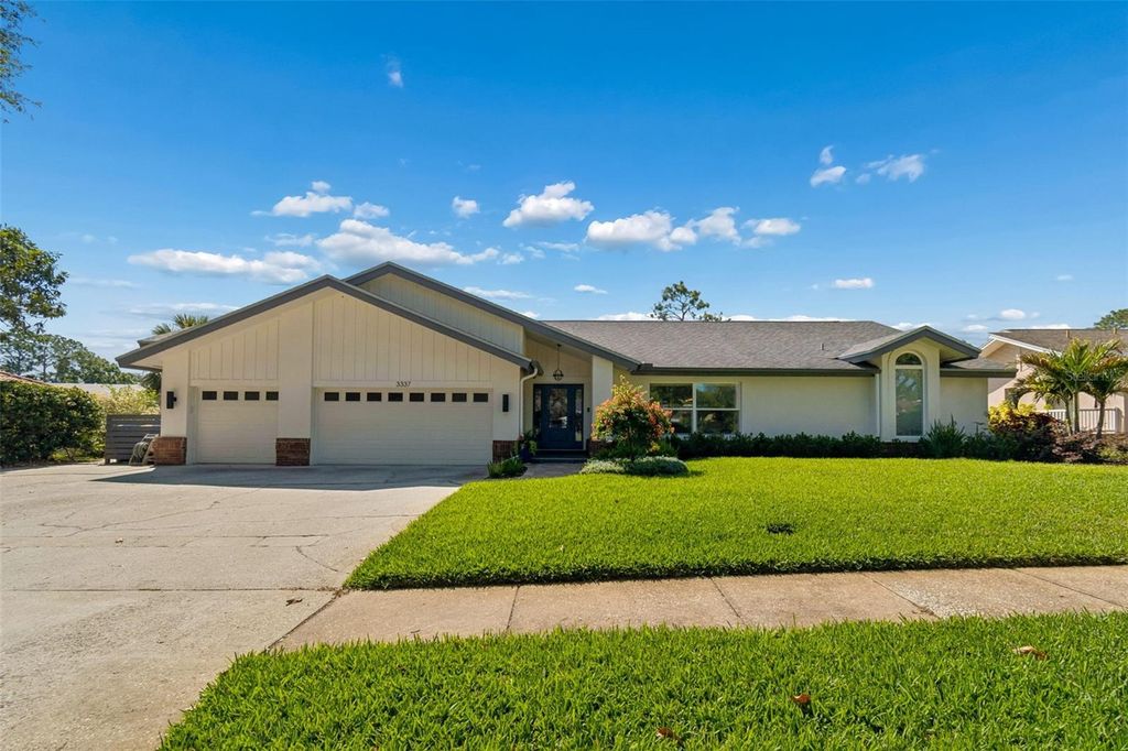 Photo of 3337 Hyde Park Drive, Clearwater, FL 33761 (MLS # TB8502388)