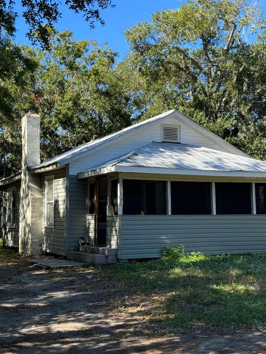 SELLER SAYS, BRING ME OFFERS, VERY MOTIVATED, SERIOUS OFFERS ONLY*****This 2-bedroom 1 bath home is located approximately 20 minutes to Cape Canaveral and approximately 20 minutes to Coco Beach. Needs some updating, has real wood stone burning fireplace, some newer wood flooring has been installed, needs new flooring in bedrooms, refrigerator and range stay.  Lot size is 50' X 122'. Don't let this opportunity pass you by. Great rental property.
