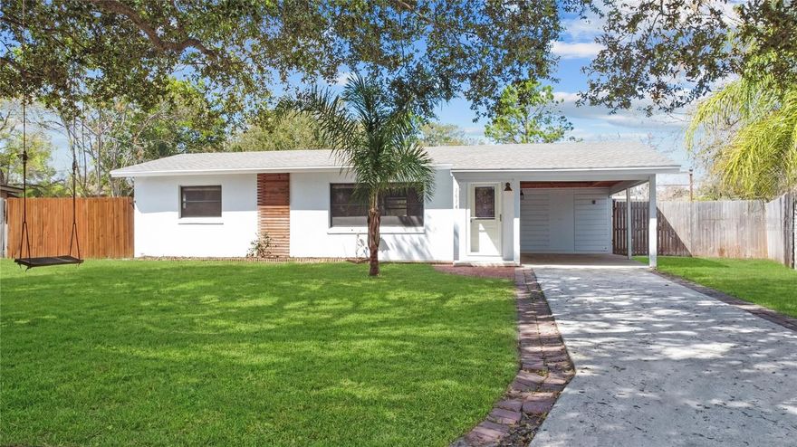 One or more photo(s) has been virtually staged. A place for dreams to take root! This cute bungalow is located in Peach Manor, a sweet NO HOA community in the heart of Ocoee, a suburb of Orlando and Winter Garden. This Central Florida location is ideal with a short commute to EVERYTHING! This well constructed block home sits on a large lot with a fenced backyard ready for your outdoor oasis! This home currently offers 2 bedrooms and one bath with room to expand and continue to build equity! Creating a 3rd bedroom and bath could be done inexpensively by utilizing the carport and then adding a detached garage if needed! The main living space, kitchen and dining area have tile floors and a neutral paint scheme. French Doors let in a good bit of light and a pretty view of the back lawn. The kitchen has real wood cabinets with a window overlooking the backyard and just a cute homey vibe. The stylish bathroom renovation has an artsy brushed gold & glass shower door, upgraded matching shower fixtures, new tile and a new vanity! Block construction, a new drain field & a new roof ensures many of the pricey components of home ownership won't give you any surprises! Home would make a great forever home, starter home or investment property! A great footprint to make it your very own! Living here, you’re close to the famous attractions many wait their entire lives to visit once! Enjoy never-ending places to go shopping & amazing restaurants; more importantly, easier access to world class healthcare, job opportunities and a ton of educational choices!