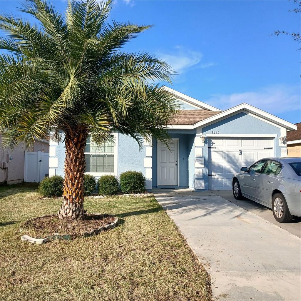 Photo of 4896 NE 123rd Lane, Oxford, FL 34484 (MLS # OM714455)