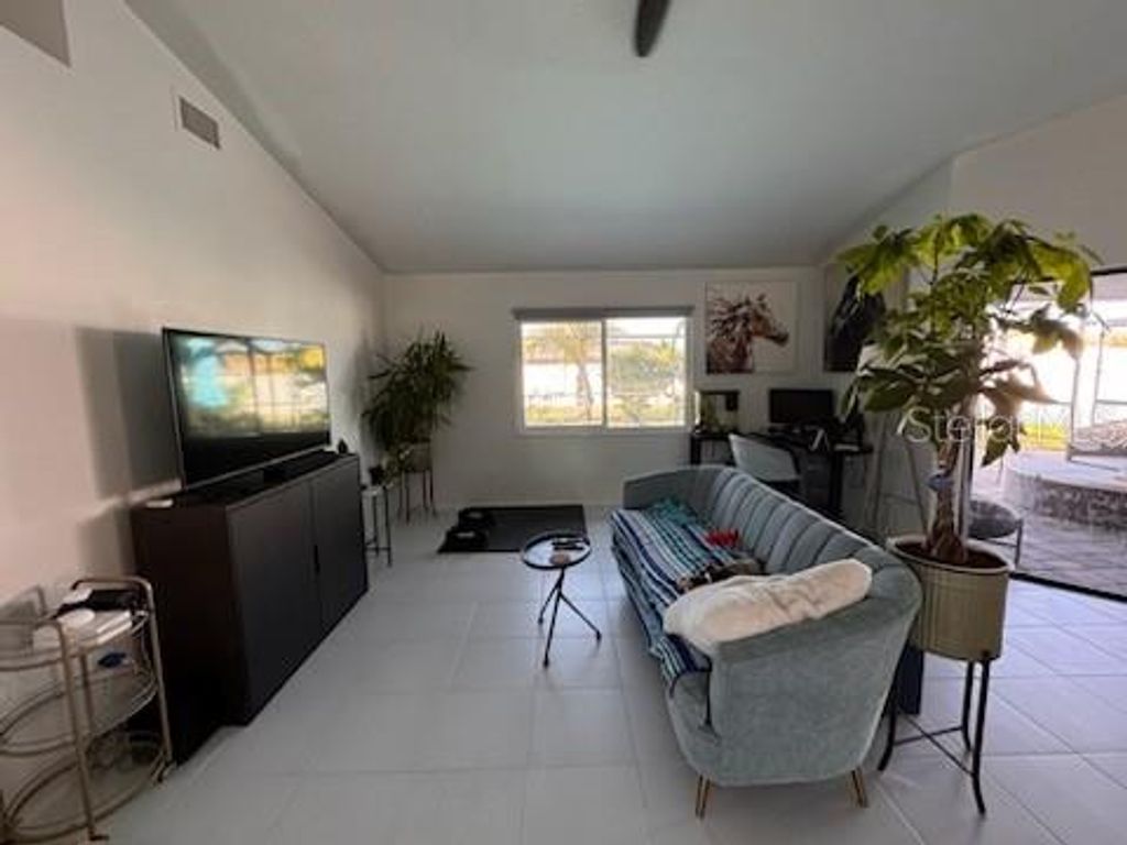 Photo of 32 NE 13th Place, Cape Coral, FL 33909 (MLS # TB8469141)