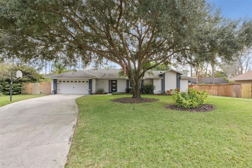 Located on a quiet cul-de-sac in the sought-after Silver Woods subdivision, this beautifully remodeled one-story home offers a setting that feels both private and inviting. A spacious front yard creates a welcoming first impression, while the oversized, fully fenced backyard delivers a true park-like retreat with lush landscaping, no rear neighbors, and a saltwater pool with spa—ideal for relaxing or entertaining. Inside, the home was completely renovated between 2018 and 2019 and features engineered wood flooring throughout, a stunning modern kitchen, and tastefully updated baths. The thoughtfully designed split floor plan offers both functionality and privacy, with a spacious primary suite set apart from the secondary bedrooms. The living room is open to the kitchen, creating a seamless flow for everyday living and entertaining, while the kitchen is highlighted by quartz countertops, a counter-height breakfast bar, and generous workspace. Additional living areas include a formal dining room accented by a stone-front fireplace, along with a versatile flex space just off the kitchen that works beautifully as a dinette or casual sitting area. A convenient half bath and a dedicated laundry room with built-in cabinetry add to the home’s everyday practicality. Natural light fills the living spaces through double-pane windows, highlighting the home’s clean, contemporary finishes. Extensive updates provide peace of mind, including a new roof and A/C in 2021, updated interior and exterior electrical panels in 2022, blown-in attic insulation, an EV outlet in the garage, water heater in 2024, and a water softener with reverse osmosis system and new pool filter added in 2025. The location offers everyday convenience with easy access to nearby shopping, dining, and major roadways, making commuting and daily errands simple. This move-in-ready home blends modern comfort with exceptional outdoor living in a quiet, established neighborhood.