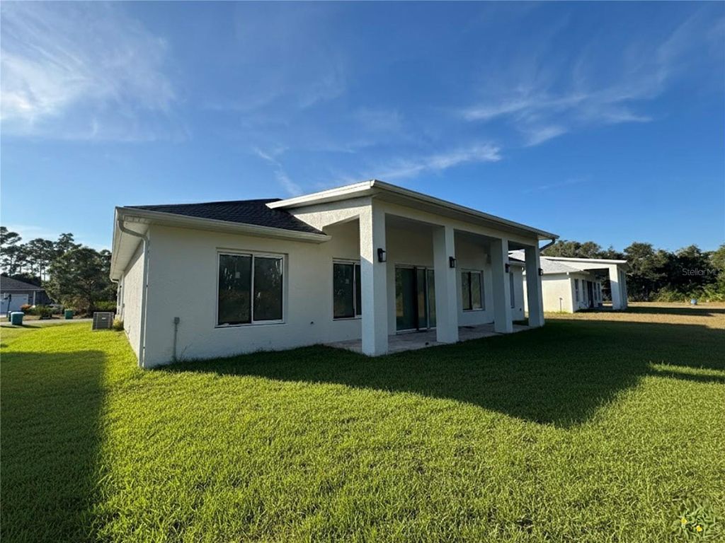 Photo of 23372 Rosewood Avenue, Punta Gorda, FL 33980 (MLS # O6378032)