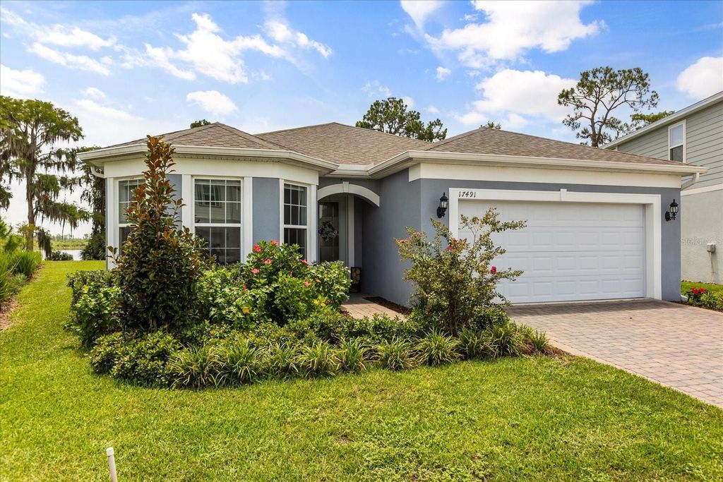 Photo of 17491 Saw Palmetto Avenue, Clermont, FL 34714 (MLS # O6332154)