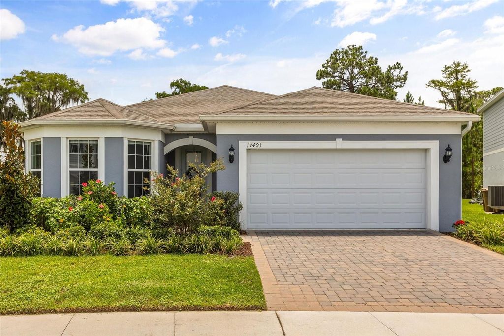 Photo of 17491 Saw Palmetto Avenue, Clermont, FL 34714 (MLS # O6332154)