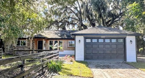 Photo of 12022 SE Sunset Harbor Road, Weirsdale, FL 32195 (MLS # R4910092)