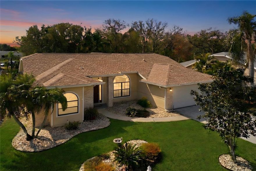 If you’ve been searching for a home that allows you to simplify your lifestyle without sacrificing quality or location, this fully updated residence delivers exactly that. Thoughtfully redesigned from top to bottom, it offers a clean, modern feel with all the major improvements already completed—so you can move in and immediately start enjoying Sarasota without the burden of projects, maintenance, or uncertainty.

From the moment you step through the entry, the home feels open, bright, and easy to live in. Soaring ceilings and a natural flow between the main living areas create a comfortable, uncluttered environment that’s ideal for both everyday living and hosting friends or family when they visit. The space transitions seamlessly to the screened lanai and private pool, offering a quiet outdoor setting that’s perfect for morning coffee, evening relaxation, or casual entertaining—without the upkeep of a large, demanding yard.

The kitchen has been completely updated with quartz countertops, custom cabinetry, stainless appliances, and a generous island that serves as the natural gathering point of the home. It opens directly to the living and dining areas, creating a layout that feels connected and functional without being overwhelming. Whether you’re cooking for two or hosting a small group, everything is right where it should be.

Every detail throughout the home has been refreshed—from wood-grain tile flooring throughout and lighting to doors and finishes—creating a cohesive, move-in-ready environment. More importantly, the behind-the-scenes updates provide real peace of mind, including a brand new roof, updated HVAC system with an IR air purification filter, and a whole-home water filtration system, offering cleaner air, better water quality, and long-term reliability.

The primary suite is designed as a comfortable, private escape, with ample closet space and a beautifully updated bathroom that feels calm and refined. Guest bedrooms are well-positioned to provide privacy when friends or family visit, while still maintaining a manageable footprint that doesn’t feel excessive or difficult to maintain.

Outside, the fully fenced yard and pool area offer privacy without the burden of heavy landscaping. It’s a space designed to be enjoyed, not managed—ideal for those who want a lock-and-leave lifestyle or simply less day-to-day upkeep.

What truly sets this home apart is its location. Situated in a well-established, quiet neighborhood, you’re just minutes from everything—shopping, dining, healthcare, and daily conveniences—while still feeling tucked away from the busier areas. Whether it’s a quick trip to the Mall at UTC, grocery store, dinner nearby, or heading out to enjoy Sarasota’s beaches and cultural amenities, everything is easily accessible without long drives or complicated logistics.

For buyers looking to right-size into something more manageable, more updated, and more centrally located, this home checks all the boxes. It offers the ease of an updated home, the character of an established neighborhood, and a lifestyle built around convenience, comfort, and low maintenance.

Simply put, this is the kind of home that makes life easier—and that’s exactly the point.