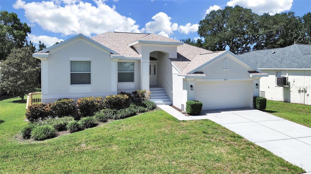 Photo of 1025 Lake Avoca Place, Tarpon Springs, FL 34689 (MLS # TB8520447)