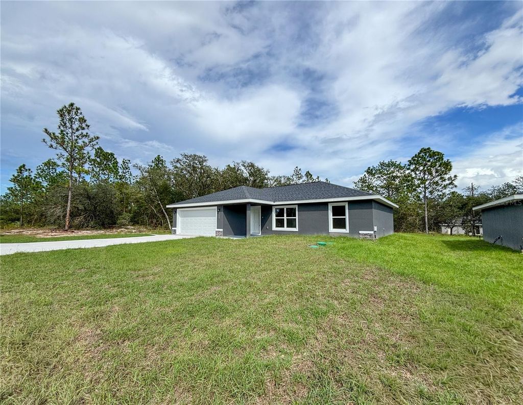 Photo of 2529 SW Breezy Point Drive, Dunnellon, FL 34431 (MLS # OM711105)