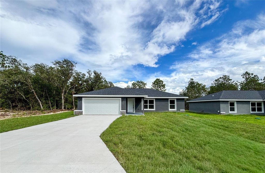 Photo of 2529 SW Breezy Point Drive, Dunnellon, FL 34431 (MLS # OM711105)