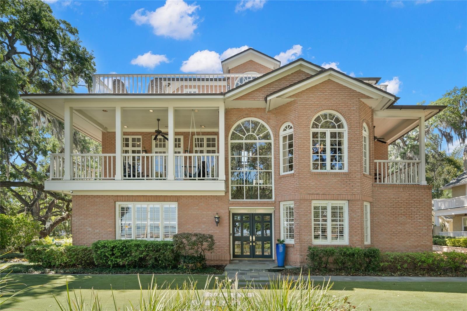 This remarkable residence is strategically situated on the corner of Bayshore and Hawthorne with beautiful views of the waterfront and downtown Tampa. The home was custom built by the owner and designed to take advantage of the water views and is handsomely appointed with incredible attention to details. .The blue stone paver walkway leads you to the double paned glass entry doors and into the 2 story dramatic foyer with an abundance of natural light. The first level also offers 2 bedrooms and a full bath. Currently, one of the bedrooms is being used as an office with plantation shutters and views of the water.The elevator will take you to the second level where you will find the spacious living room with floor to ceiling windows along with a gas fireplace and built-in bookshelves. French doors open out to an inviting covered porch in the trees with bay views. The formal dining room also features tranquil views and leads to the eat-in chefs kitchen with separate Sub Zero refrigerator and freezer, commercial gas cooktop, double ovens and a warming drawer. Additional features include white cabinetry with inset panels and black marble countertops with a custom copper sink. The 3rd floor is a wonderful owners suite featuring a fireplace with vaulted ceilings and an elegant bath with onyx floors and shower, soaking tub and bidet. French doors lead to an expansive porch with spectacular views of the Bayshore and Tampa’s skyline. Quality is evident throughout and includes brick construction, wood windows and copper gutters. Spacious 3 car garage. Close to everything that makes living in the bay area so special!