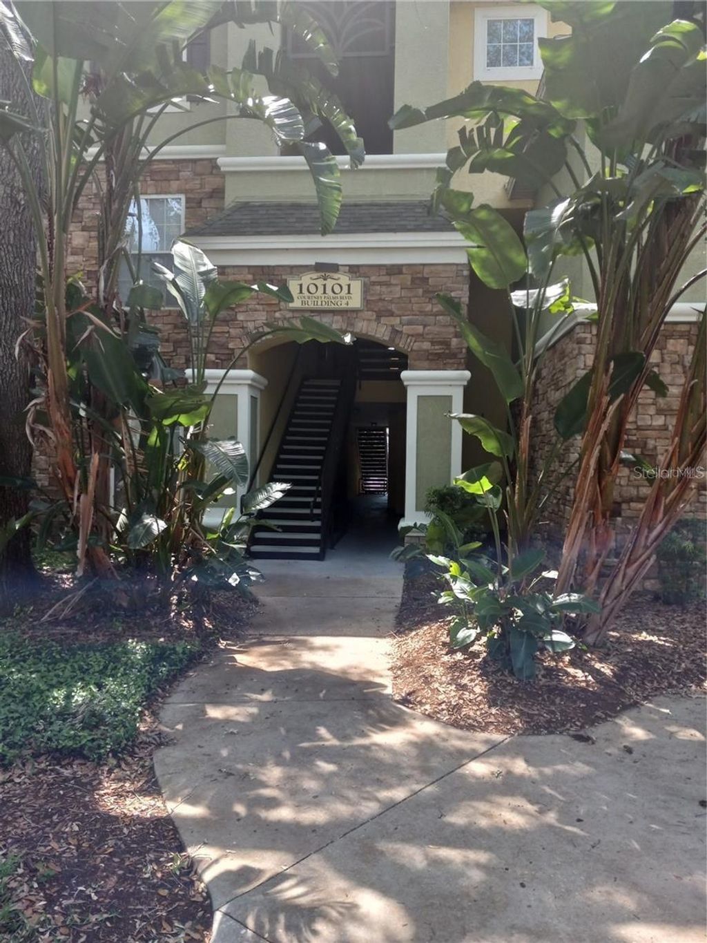 Photo of 10101 Courtney Palms Boulevard #204, Tampa, FL 33619 (MLS # TB8451380)