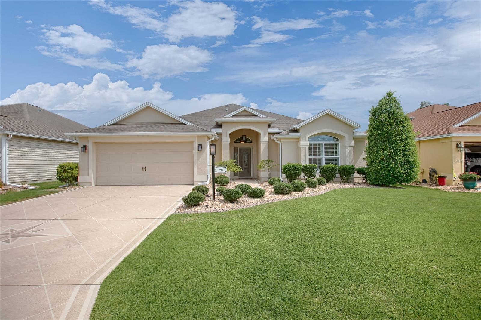 RENT BEFORE YOU BUY!!! This 2-bedroom, 2-bathroom Designer Home is in the Village of Pennecamp, 8 minutes from Lake Sumter Landing and 3 minutes from Cane Garden Country Club. The open layout includes slide-away glass doors to the enclosed lanai. The home has two queen beds—one in the master bedroom with an ensuite Roman walk-in shower, and one in the guest bedroom, located next to a bathroom with a tub/shower combo. The kitchen has stainless steel appliances and seating at the countertop, dining room, or lanai. Bonita Pass and Tarpon Boil Executive Golf Courses are 3 minutes away; Southern Star is 5 minutes. Poinciana Pool is 2 minutes away; SeaBreeze Pool & Rec Center is 4 minutes. July-October monthly $ 2700 plus taxes & fees--November $3335 plus taxes & fees--December $3600 plus taxes & fees--PLEASE CALL FOR PEAK SEASON(JAN-MAR) & WEEKLY RATES