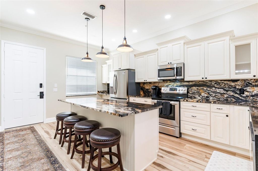 Photo of 6815 Dali Avenue #F203, Land O Lakes, FL 34637 (MLS # OM719147)