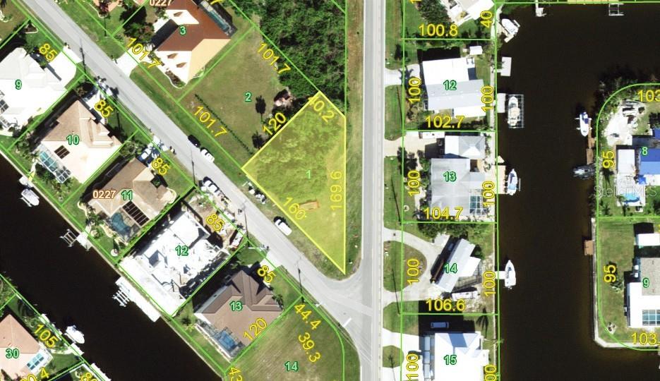 OVERSIZED CORNER lot located in the highly desirable Punta Gorda Isles community. This lot provides plenty of room to bring your vision to life - whether that means building your dream home, investing in future growth, or holding a valuable piece of land in a premier waterfront community. Need a builder? Let us introduce you to reputable builders! Enjoy all the amenities that Punta Gorda has to offer such as biking, fishing, boating, dining, live entertainment, and much more! Close to Fisherman's Village, Ponce De Leon Park, Gilchrist Park, and Historical Down-town Punta Gorda. Just a short car ride to award-winning beaches!
