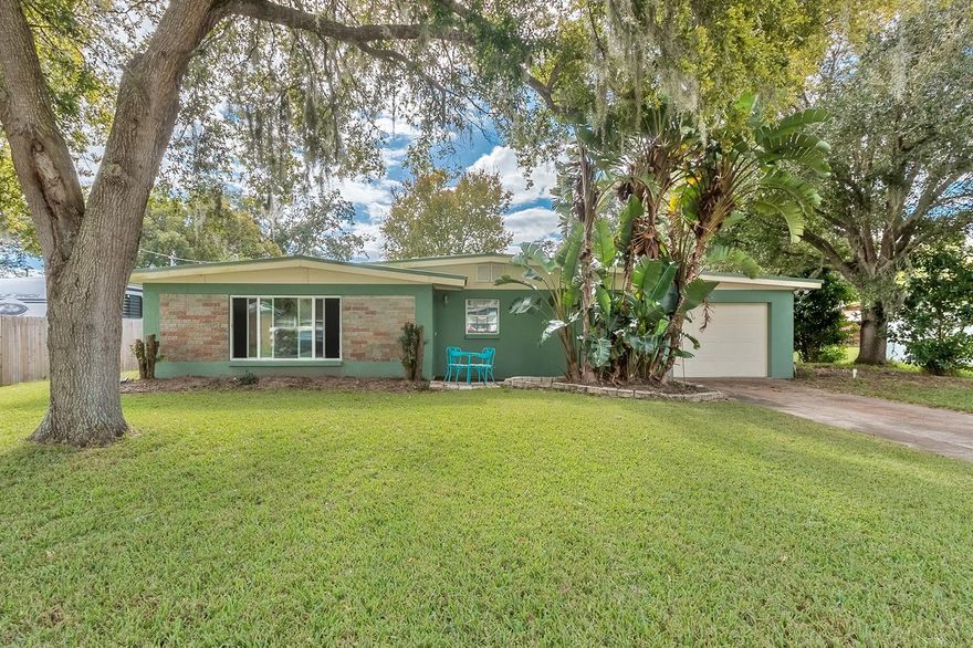 Hurry, this MOVE-IN READY 3 bedroom/1.5 bath home is updated from head to toe and is sure to sell quick! This concrete block build is extremely well-maintained with a 40 year metal roof installed in 2019, newer hot water heater, and a new 2020 air conditioning unit. The interior boasts tasteful upgrades such as hardwood soft close cabinets, updated countertops, stainless steel appliances and updated flooring. Both bathrooms are completely updated. The open and spacious living room offers plenty of space for a family and entertaining, as well as the huge, fenced in back yard! NO HOA – Bring your toys! Call to schedule a showing today (386)690-6757 ;Water: City