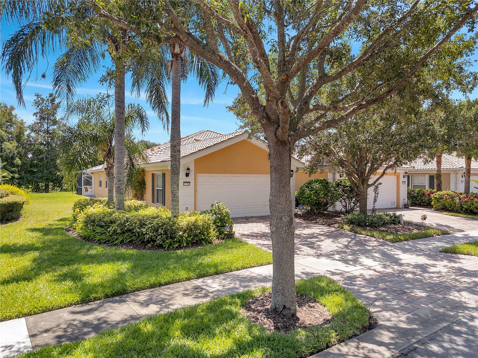 This 2-bedroom, 2-bathroom home features a heated pool and is situated in the heart of the highly sought-after VillageWalk community. Built by DiVosta Homes, this popular Capri III floor plan includes thoughtfully designed living spaces, high-quality construction, and a seamless blend of comfort and functionality.Step inside to an open-concept layout with high ceilings and windows that flood the space with natural light. The spacious great room connects seamlessly to the central kitchen, which has been beautifully upgraded with new stainless steel appliances, including a refrigerator, stove, microwave, and dishwasher. This setup is perfect for cooking, while the breakfast bar provides a casual dining option.The primary suite includes a walk-in closet with built-in shelving and an en-suite bathroom that features dual sinks and a walk-in shower. The secondary bedroom is also generously sized and conveniently located next to the guest bathroom, making it ideal for visitors or family members.A versatile bonus room just off the main living area can easily be transformed into a home office or cozy den, providing the flexibility to suit your lifestyle.  The spacious laundry room, which includes a washer and dryer, a utility sink, extra closet storage, and direct access to the attached two-car garage and provides a convenient daily flow from the car to the home.Experience Florida living at its finest with your very own private pool, complete with a screen enclosure and beautiful views of the peaceful pond just beyond your backyard. This home has been meticulously maintained and thoughtfully updated, featuring a new A/C unit for year-round comfort, a new water heater, a new pool heater for easy entertaining in any season, and new gutters for improved drainage and home protection.VillageWalk at Lake Nona is a thoughtfully designed master-planned community that offers the ultimate in resort-style living. Picturesque bridges and scenic canals wind through the neighborhood, connecting residents to various on-site amenities, including a deli, gas station, and a vibrant town center. Outdoor enthusiasts will appreciate the lighted walking and biking trails, sports courts, and heated swimming pools, while the 24-hour fitness center supports an active lifestyle.Just minutes away is Lake Nona Town Center—a dynamic 100-acre open-air destination featuring public art displays, upscale shopping, hotels such as the iconic Lake Nona Wave Hotel, and Boxi Park. This lively venue is family- and dog-friendly, offering a mix of restaurants and bars, beach volleyball courts, and a live entertainment stage.Families can take advantage of access to top-rated A-rated schools, and the community’s prime location near Medical City and Orlando International Airport makes travel convenient. World-renowned attractions like Disney, SeaWorld, and Universal Studios are just a short drive away. HOA fees include lawn care, high-speed internet, and cable, ensuring truly hassle-free living.