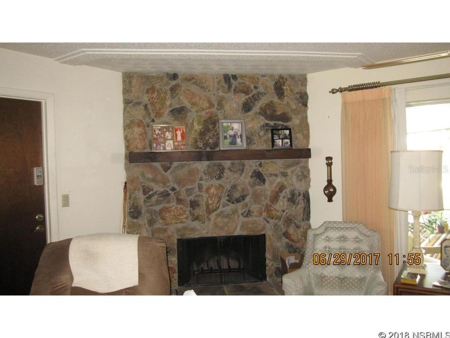 FULLY FURNISHED - MOVE IN READY - UNIQUE. AMAZING 3 BEDROOM, 2 BATH, 1488 SQFT LIVING AREA, COZY WOOD BURNING FIREPLACE IN LIVING ROOM, UNIQUE KITCHEN WITH "ROUNDED" BREAKFAST BAR AND "ROUNDED" AREA ABOVE BREAKFAST BAR WITH RECESSED LIGHTING. ARCHITECTURAL FEATURES IN LIVING ROOM ABOVE FIREPLACE IN KITCHEN AND MASTER BEDROOM. NEED CLOSET SPACE - THIS HOME HAS IT! SLIDING GLASS DOOORS IN LIVING ROOM AND MASTER BEDROOM LEAD TO SPACIOUS SCREENED PORCH. 2 CAR GARAGE - SPRINKLER SYSTEM ON WELL - TRANSFERABLE TERMITE BOND. ;Water: City