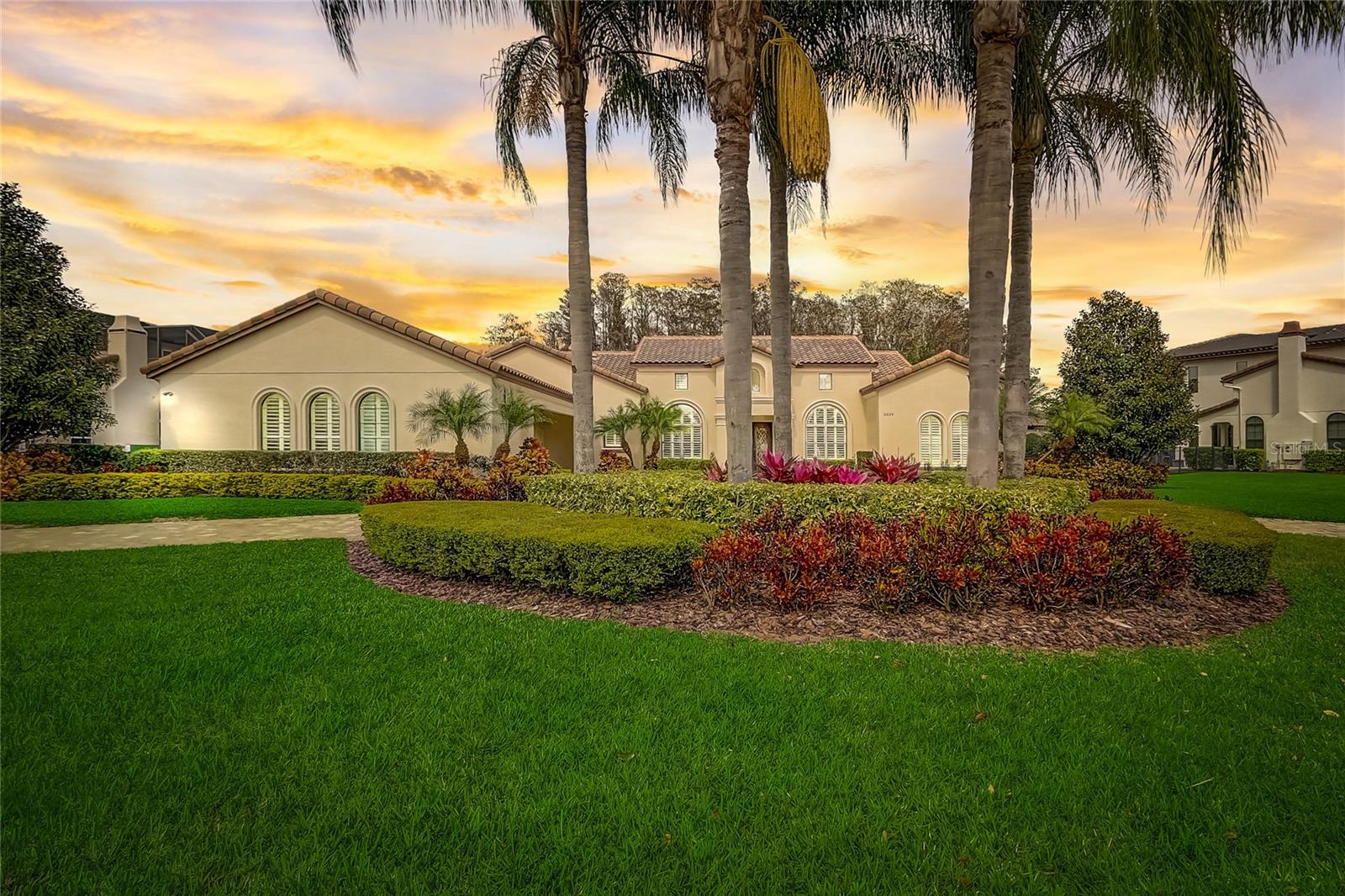 One or more photo(s) has been virtually staged. Come home to luxury in your own private oasis with this custom Silliman Home, located in the highly desired, guard gated community of Waterstone. Set upon a full acre, this hard to come by premier lot overlooks a wooded Cypress tree conservation area. With true Mediterranean style this "Villa Rosa" model is lined with sliding glass doors and windows. From the moment you walk in the home you are greeted with amazing views of the pool and outdoor living spaces. Perfect for Florida's climate, this plan offers a host of outdoor living space including a resort style pool and spa, all travertine decking and is very accessible from many areas throughout the home. This large L shaped lanai features retractable motorized screens, stone gas fireplace and large summer kitchen with a gas grill and outdoor Sub-Zero refrigerator. Great for entertaining, the entire home features surround sound inside and out. Upon the heart of the home, the Chef's kitchen includes two large islands with two double sinks, dining nook, and an immense "hidden" walk-in pantry, with high-end Wolf and Sub-Zero appliances, including a Wolf Induction cooktop. This all overlooks the family room and exterior living spaces. The right wing of the home features the primary suite, which includes a large walk-in California closet and breakfast bar, including sink, refrigerator, and cabinets for additional storage. The left wing includes 3 bedrooms, 3 baths, and an oversized flex room. The home features a Culligan water softener system and natural gas throughout, including tankless gas water heaters and a large utility room with gas or electric washer/dryer hookups. There is an ample amount of storage in this home, especially with an oversized 3 car garage, complete with epoxy finished floors and service door entry, you will be able to fit all of your storage and motor vehicle needs. Waterstone is conveniently located around the corner from Windermere Preparatory School with “private” gated access, Windermere High School, minutes from Disney, shopping, dining, and all that Central Florida has to offer. Book your showing now and don’t miss your opportunity to call this amazing property home!