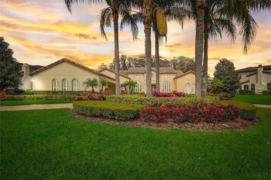 One or more photo(s) has been virtually staged. Come home to luxury in your own private oasis with this custom Silliman Home, located in the highly desired, guard gated community of Waterstone. Set upon a full acre, this hard to come by premier lot overlooks a wooded Cypress tree conservation area. With true Mediterranean style this "Villa Rosa" model is lined with sliding glass doors and windows. From the moment you walk in the home you are greeted with amazing views of the pool and outdoor living spaces. Perfect for Florida's climate, this plan offers a host of outdoor living space including a resort style pool and spa, all travertine decking and is very accessible from many areas throughout the home. This large L shaped lanai features retractable motorized screens, stone gas fireplace and large summer kitchen with a gas grill and outdoor Sub-Zero refrigerator. Great for entertaining, the entire home features surround sound inside and out. Upon the heart of the home, the Chef's kitchen includes two large islands with two double sinks, dining nook, and an immense "hidden" walk-in pantry, with high-end Wolf and Sub-Zero appliances, including a Wolf Induction cooktop. This all overlooks the family room and exterior living spaces. The right wing of the home features the primary suite, which includes a large walk-in California closet and breakfast bar, including sink, refrigerator, and cabinets for additional storage. The left wing includes 3 bedrooms, 3 baths, and an oversized flex room. The home features a Culligan water softener system and natural gas throughout, including tankless gas water heaters and a large utility room with gas or electric washer/dryer hookups. There is an ample amount of storage in this home, especially with an oversized 3 car garage, complete with epoxy finished floors and service door entry, you will be able to fit all of your storage and motor vehicle needs.  Waterstone is conveniently located around the corner from Windermere Preparatory School with “private” gated access, Windermere High School, minutes from Disney, shopping, dining, and all that Central Florida has to offer. Book your showing now and don’t miss your opportunity to call this amazing property home!