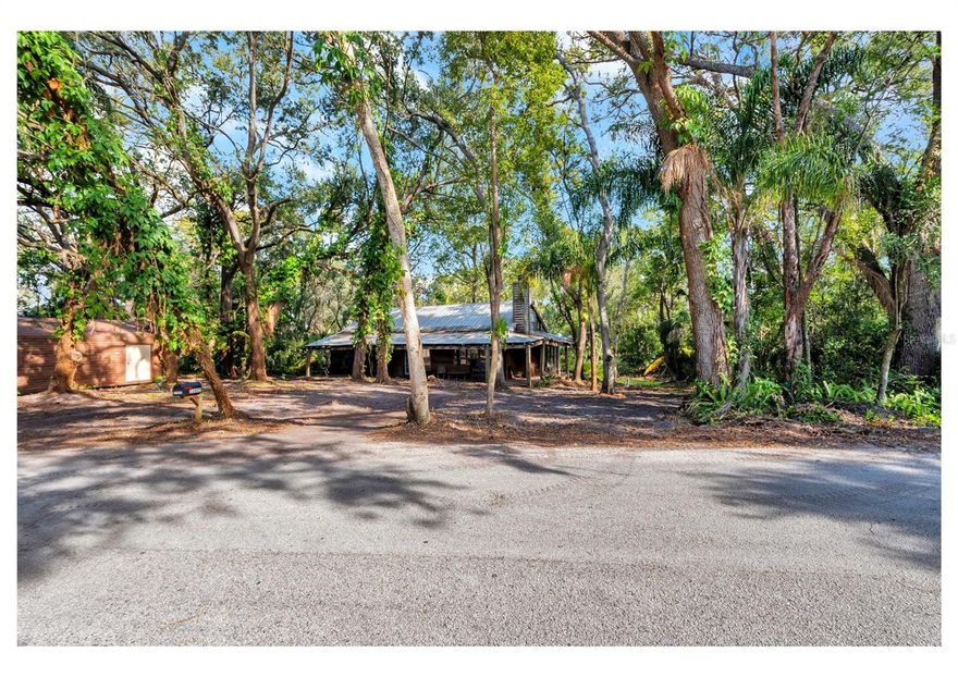 Discover a rare opportunity to acquire a generously sized .85-acre homesite in the heat of Forest Hills, just minutes from Carrollwood. Offered at land value, this property presents an excellent opportunity for those seeking space, privacy, and flexibility in a prime Tampa location. Surrounded by mature trees and a peaceful natural setting, the property offers a serene environment ideal for a custom residential vision. A small pond on the property enhances its natural charm and provides a tranquil backdrop for thoughtful site planning. With no HOA, this property allows for exceptional freedom and versatility. Whether envisioning a custom home with room for additional storage, recreational vehicles, or future expansion, or considering long-term investment potential, the possibilities are extensive. Ideally situated 1 mile from the Babe Zaharias Golf Couse, near shopping, dining, medical facilities, and major roadways, this location provides quick access to everything Carrollwood and Tampa have to offer. Approximate drive times of 20 minutes to Downtown Tampa, 25 minutes to Tampa International Airport, 40 minutes to Gulf beaches, and about 1.5 hours to Disney. Opportunities of this size and location are increasingly rare. Whether you’re planning a future build, investment, or long-term hold, this Forest Hills property offers space, freedom, and proximity to one of Tampa’s most established areas.