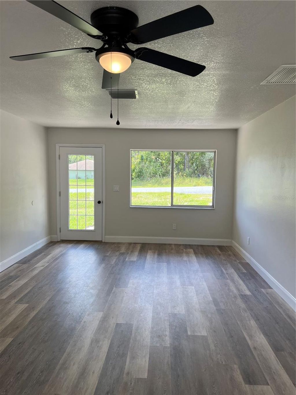 Photo of 11031 Spoonbill Road, Weeki Wachee, FL 34613 (MLS # W7878393)