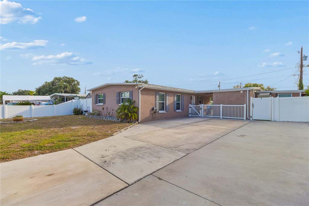Photo of 1715 Waikiki Way, Tampa, FL 33619 (MLS # TB8524966)