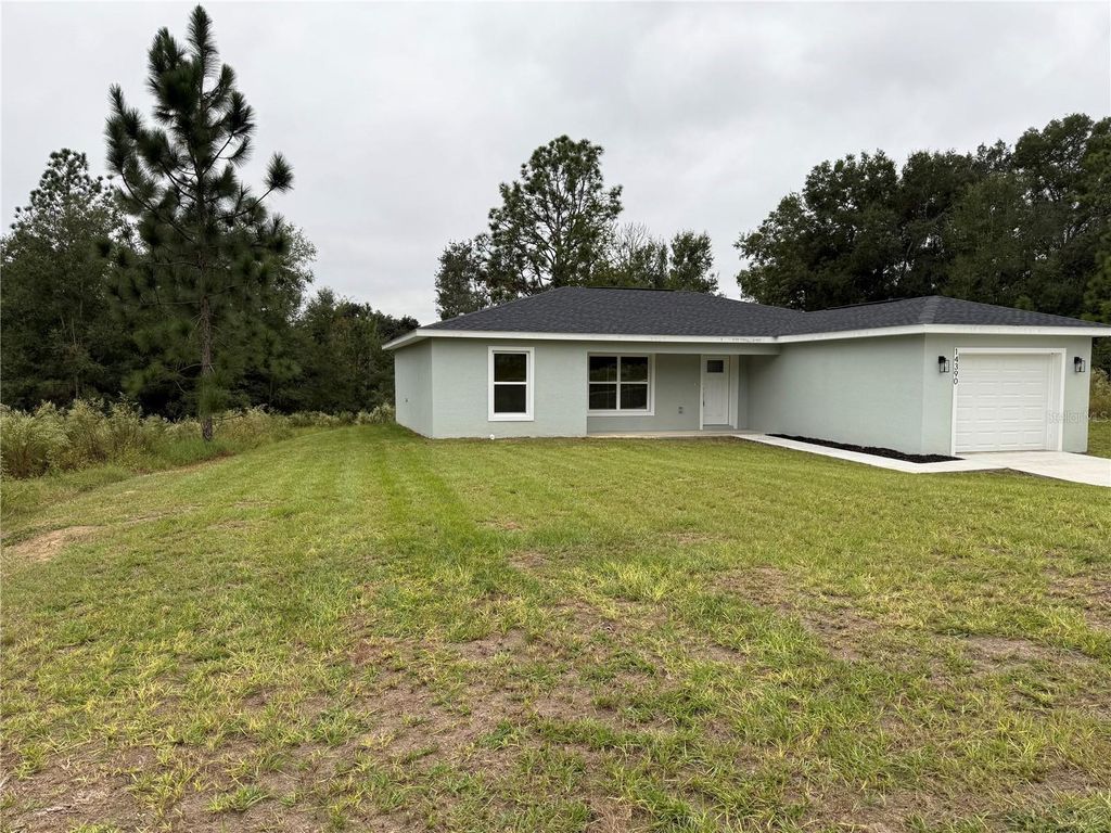 Photo of 14390 SW 30 Place, Ocala, FL 34481 (MLS # OM712622)