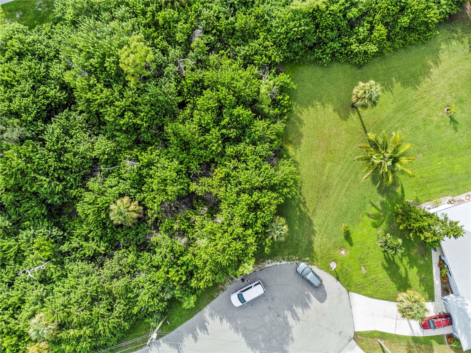 One or more photo(s) has been virtually staged. Great Building Lot located in quiet neighborhood of Waterway Colony. Lot sits on a Cul-De-Sac with Water and Electricity available. No HOA or deed restrictions. Vacant Residential GS-3.5. Close to St. Andrews South Golf Club, the Yacht Club, Fishermen's Village, Peace River Wildlife Center, Harborwalk and the Historic Downtown area of Punta Gorda, you can have access to arts, community events, entertainment, waterparks, fishing piers, boats ramps, medical care, fine dining and shopping. IMPORTANT NOTE: Buyers and buyer’s agents are solely responsible for verifying all information related to zoning, land use, access to public systems, permitting requirements, and any development restrictions directly with the County. Survey is available in the attachments. Please contact the listing agent with any questions. Don't miss this opportunity!