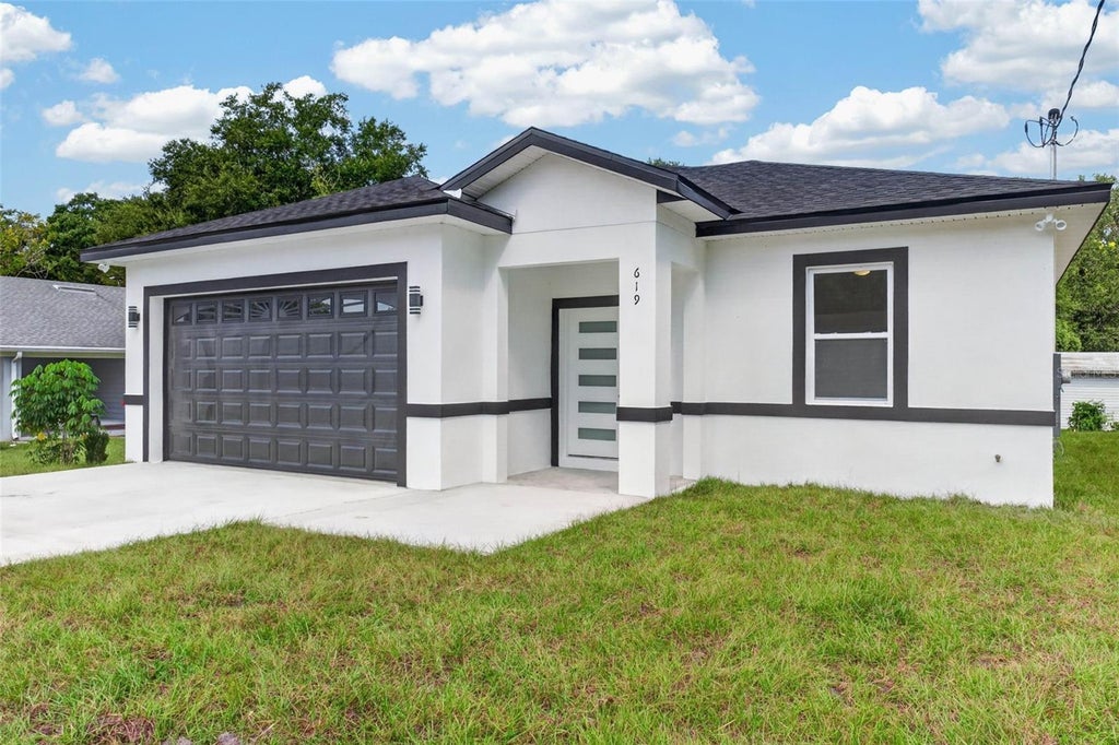 Photo of 619 W Valencia Street, Lakeland, FL 33805 (MLS # TB8552712)