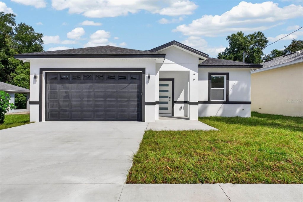 Photo of 619 W Valencia Street, Lakeland, FL 33805 (MLS # TB8552712)