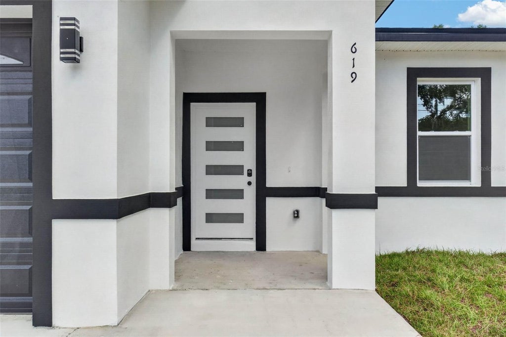 Photo of 619 W Valencia Street, Lakeland, FL 33805 (MLS # TB8552712)