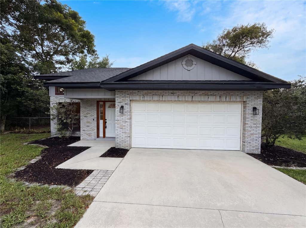 Photo of 1542 April Avenue, Deltona, FL 32725 (MLS # O6413797)
