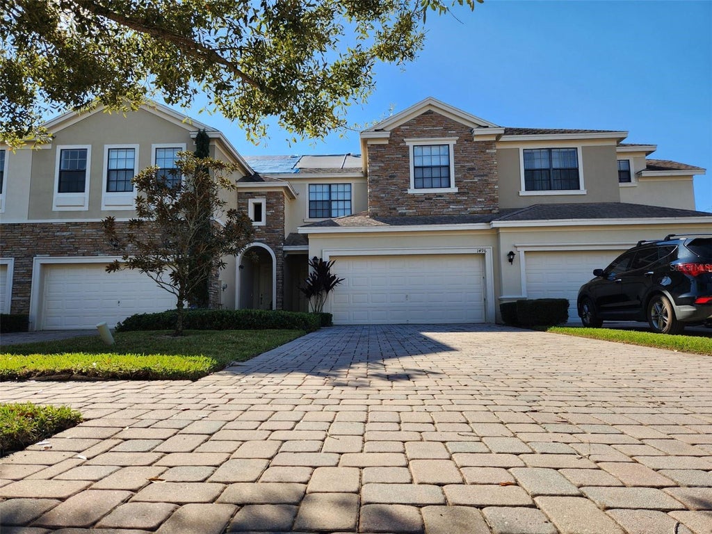 Photo of 1496 Portofino Meadows Boulevard, Orlando, FL 32824 (MLS # S5153156)