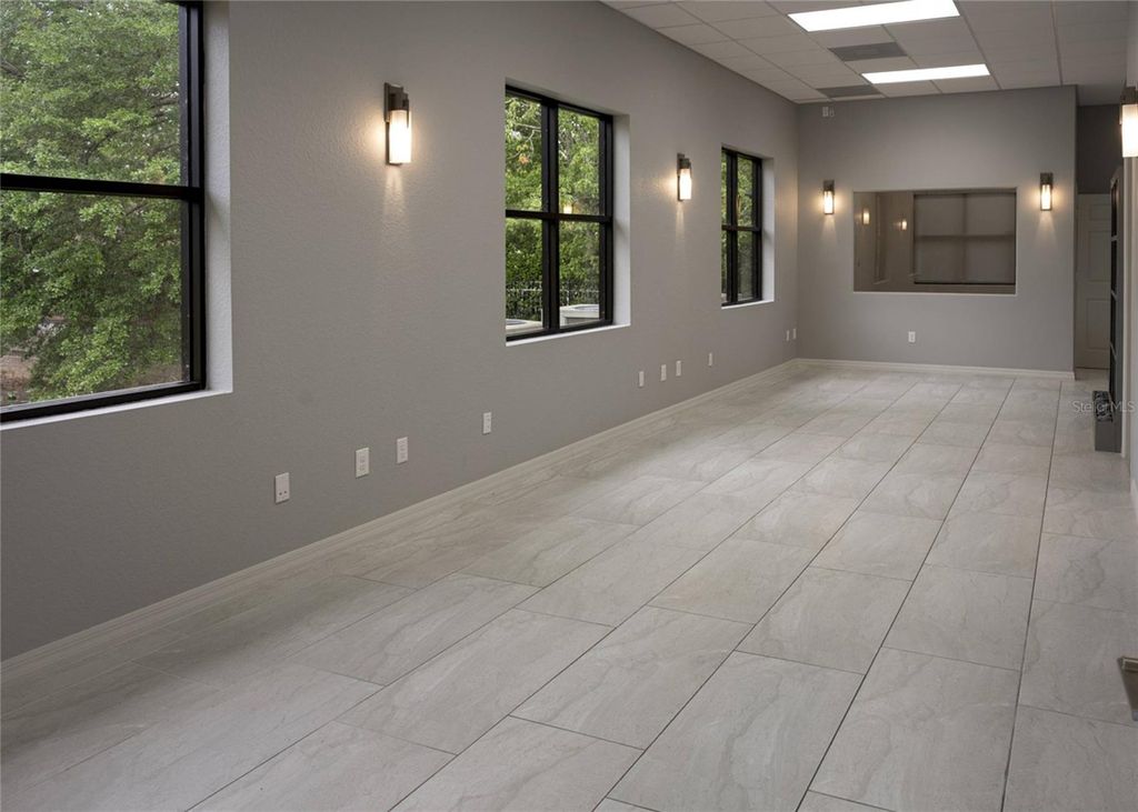 Photo of 1445 E Mitchell Hammock Road #1, Oviedo, FL 32765 (MLS # O6382771)