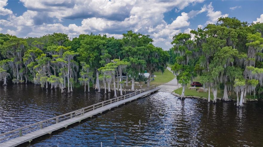 WALK TO LAKE GEORGE! Bring your BOAT! Georgetown Cove at Paradise Lakes. High and Dry, on smooth, flat dirt road. Build anytime. Putnam Co has NO IMPACT FEES at this time. Custom homes, mobile homes, and Small homes (minimum 700 SF) are allowed. RV’s and camping also allowed (some restrictions). Optional POA is Only $45 Year Provides road maintenance, private owner only gated 10 acre waterfront recreational park located directly onLake George with short-term campsites, permanent BBQ grills, boat launch, covered outdoor kitchen area, fire pit, playground, picnic benches, and more. This eastern section of the community borders Lake George Wildlife Management Area, a conservation area offering camping, hiking,fishing, and wildlife viewing! Retreat, retire, or full-time family living. Country Comfort is Calling! Nearby Town of Welaka home of the Next BassPro Resort! Beaches only an hour away. State and local parks nearby. Also enjoy the St Johns River, Dunns Creek, Crescent Lake, and the OcalaNational Forest featuring more than 600 lakes, rivers, and freshwater springs offering endless swimming, fishing, snorkeling, canoeing andboating opportunities. Only 30 mins to Palatka, 1 Hour to St Augustine Beach, 1 Hour to Daytona Beach International Airport. Don't miss youropportunity to invest in Florida! Septic and Well Needed. Power poles Nearby. Voluntary Property Owner Association Fee of $45 per Year provides Private 10 Acre Resident Park and access to Dock, Boat ramp, RV hook-ups, Lake George and St Johns River Access, Boat Ramp.  Two other lots available.  Package offers encouraged.  ID: 07-13-27-7060-0110-0350 and 19-10-24-4074-0300-0070