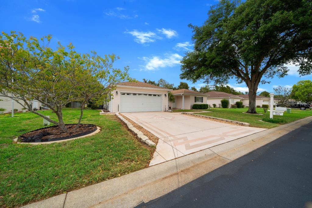 Photo of 11876 SW 137th Loop, Dunnellon, FL 34432 (MLS # OM734659)