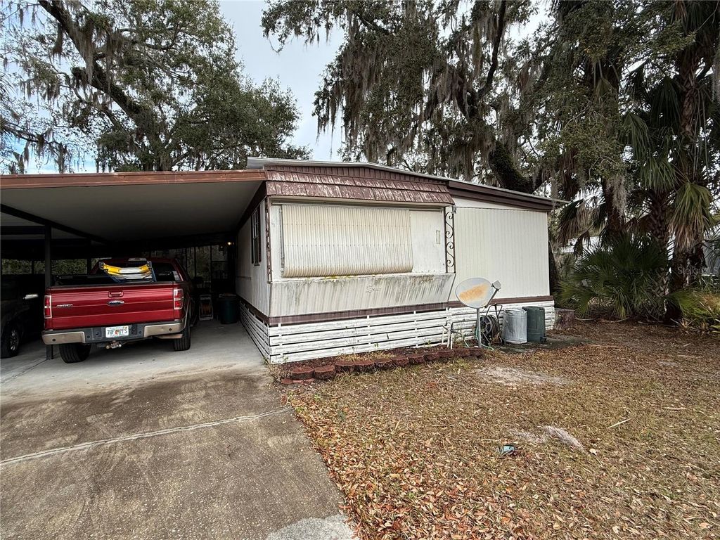 Photo of 69 Rosalie Oaks Boulevard, Lake Wales, FL 33898 (MLS # TB8483308)