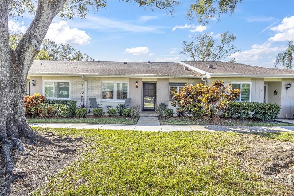 Photo of 1035 Dunrobin Drive #C, Palm Harbor, FL 34684 (MLS # TB8433713)
