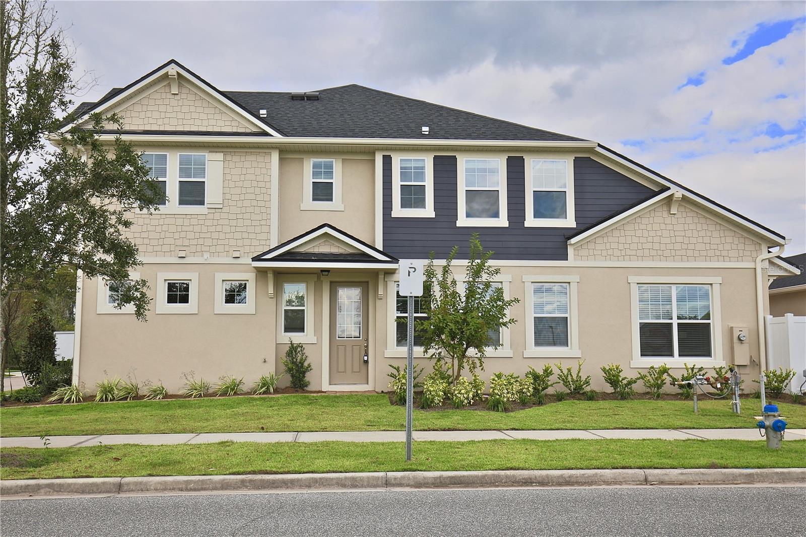 Beautifully Appointment 3/2 Modern Townhome with a Paved Courtyard and a Detached 2 Car Garage in the Desirable Community of Randal Park - Orlando! Available Now! Full service lawn care included!
The Randal Park Community offers residents a resort style community pool, splash park, playground, clubhouse, fitness area, open-air pavilion and features 8 neighborhood parks, including a 5-acre central park, miles of biking/hiking trails. This beautiful 2 story townhome has a bright and spacious floor plan, a gourmet kitchen that opens to both the living room and dining room area, perfect for entertaining your guests or hosting a dinner. The kitchen features dark wood cabinets with plenty of storage space, a kitchen island and breakfast bar with granite countertops and stainless steel appliances for that modern touch. Tile flooring flows throughout the main living areas and cozy carpet flooring upstairs in all the bedrooms. Adjacent to the kitchen, you have access to the paved courtyard and to the detached 2 car garage, making it super easy to bring in your groceries. The bedroom layout upstairs provides additional privacy for everyone. The spacious master suite features a walk-in closet and a master bathroom with dual vanities and a glass step-in shower. The guest bedrooms are also very spacious, with sufficient closet space and a shared full bathroom. This townhome has a laundry room with extra cabinet space (Washer and Dryer Included). Don't miss it! This property won't last long! Great location near Orlando International Airport, Lake Nona Region, Medical City, Schools, shopping, restaurants and entertainment with easy access to major roads. Pets will be considered. All residents are enrolled in the Resident Benefits Package which includes AC filter delivery, utility concierge, our best-in-class resident rewards program, and much more! More details in our Rental Selection Criteria or upon application. NO SIGHT UNSEEN APPLICATIONS.