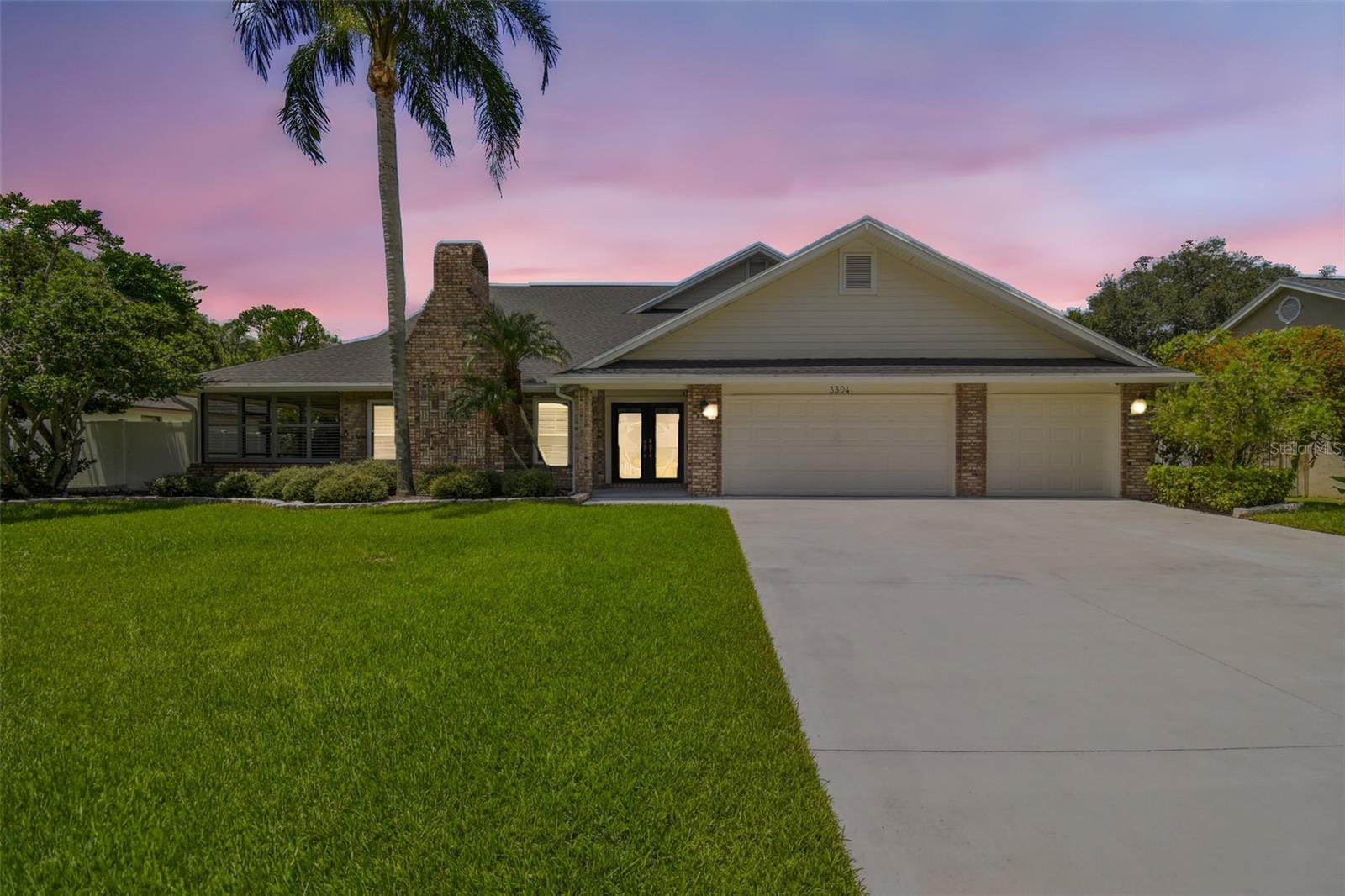 Located in highly-desirable Carrollwood the community of The Hamlet offers this stunning 5BR/4.5BA home w/bonus room, large storage room, and heated pool/spa offers the perfect combination of space and convenience. The Hamlet is known for its large lots, mature trees, and peaceful ambiance, & this property enjoys a prime position on a quiet cul-de-sac close to all that Tampa has to offer. The curb appeal is exceptional with new landscaping, an oversized 3-car-wide driveway that is extra deep, and a huge 3-car garage. The driveway includes a basketball hoop, adding a fun feature for active households. Double glass entry doors open to a welcoming foyer with beautiful luxury vinyl plank (LVP) flooring that flows seamlessly throughout nearly the entire first floor. The formal living room & adjacent dining room offer vaulted ceilings, built-in electric FP, and French doors to a screened side patio w/paver deck, plantation shutters, and side yard view creating great flow for entertaining. The kitchen boasts new quartz counters, GE Café SS appliances—refrigerator w/built-in Keurig, range w/double ovens & air-fry, built-in wall oven, microwave, dishwasher. The open design connects the kitchen to the family room and casual dining area. The oversized family room features vaulted ceilings, a 2nd built-in electric fireplace, dry bar w/cabinetry, quartz counters & new wine fridge. French doors lead to the massive covered & screened lanai with views of the heated pool w/full pool bath. Off the family room, a hallway leads to an oversized pantry, huge laundry/mud room with new washer/dryer, ample cabinetry, shelving, and a storage closet w/custom shelving. The 1st-fl primary suite is an expansive retreat with double built-in closets, plantation shutters, hurricane-rated sliders, private access to the lanai/pool, and a bright, open layout. The primary bath offers dual vanities w/granite, large walk-in shower, separate water closet, abundant cabinetry, & linen closet. A 1st-fl guest BR, currently used as an office, has marble tile flooring, built-in desk/cabinets, quartz counters, & large closet. Also on the 1st fl is a full guest bath w/granite and glass-enclosed shower. The covered/screened lanai has three ceiling fans & plenty of space for lounging/dining, leading directly to the pool finished in a premium aggregate material for lasting beauty. 2 pet doors on the screen enclosure provide direct access to the side & back yards secured w/an invisible pet fence. A dog door from the home to the side patio/yard is activated by invisible fence system for security & convenience. Up the stairs, a wrought iron railing leads to a spacious loft and a fantastic bonus room w/double skylights plus an adjacent large storage room. The upper level includes BR #3 w/built-in closets, BR #4 w/built-in shelving and shared en suite bath, and BR #5—oversized with built-in closets. Major system & finish updates (all 2022): roof, 2 A/C systems w/UV lights, all air ducts, water heater, irrigation system, plantation shutters, door hardware, garage door openers, full-home insulation, electrical panels, and all lighting. Add’l updates: water softener & electric/remote shades for 1st-fl windows/doors. The garage has an EV charger plug, and has generator-ready wiring. With its prime Carrollwood location, extensive upgrades, & pristine condition, this home is a rare opportunity for those seeking comfort, luxury, and convenience in one of Tampa’s most sought-after neighborhoods.