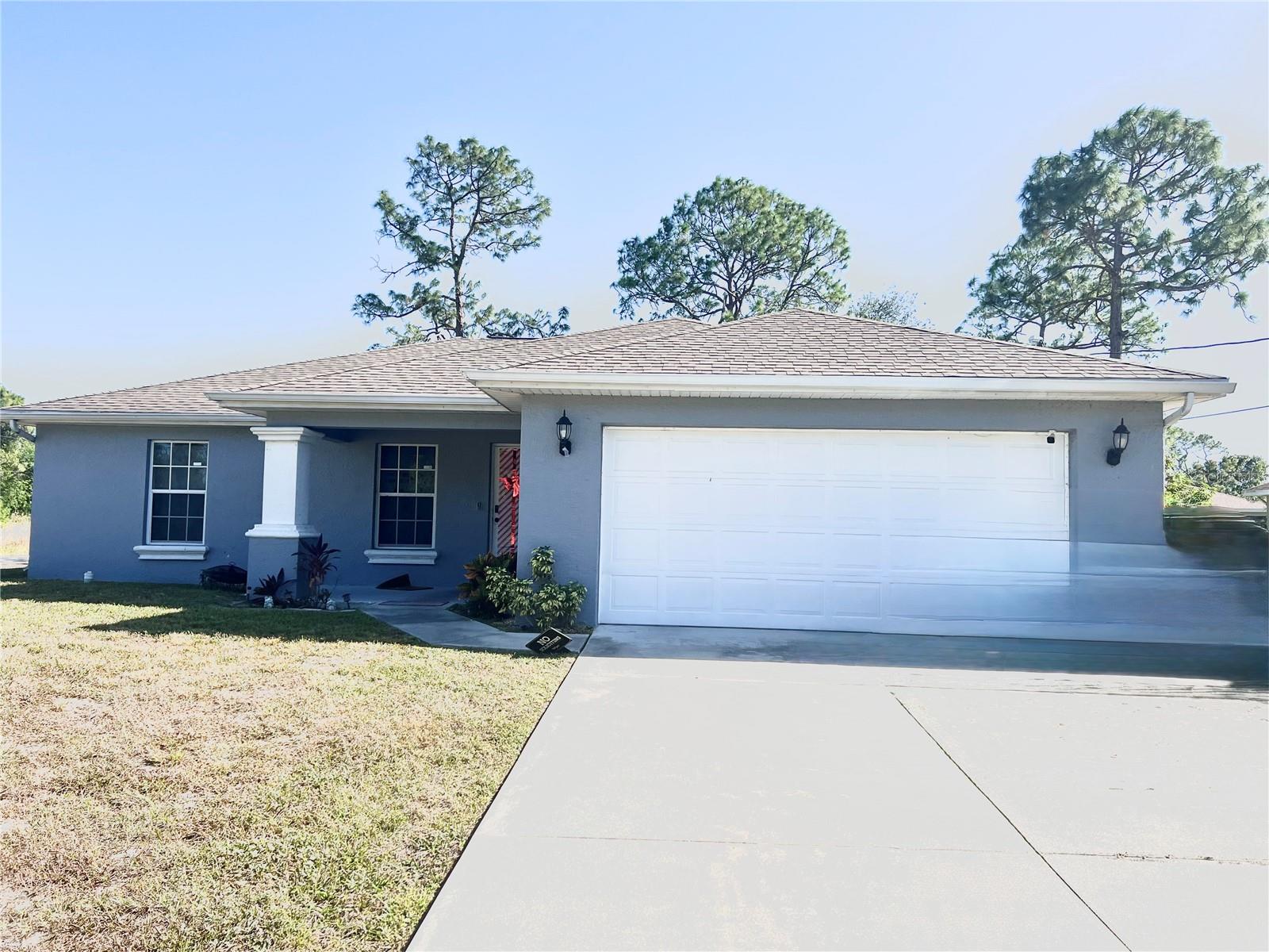 SPACIOUS, Beautiful Single Family 3 BEDROOM 2 BATHROOM home ready for move-in! Excellent location in Lehigh Acres near to Lee Blvd and shopping centers. NEW AC, WATER HEATER and Water system were all replaced in 2021. NEW water softener (2023). This is a perfect home for those seeking comfort and tranquility. Plus, it is parked in a huge .29 lot with big back yard, ready for your pool to be built. Enjoy the benefit of well water and a septic system, adding value and independence to this cozy, yet modern home Conveniently located near quality schools and a short drive to Lehigh Acres retail centers, this property offers the tranquility of suburban living with easy access to modern amenities. (Cash only)