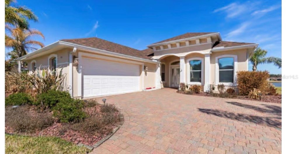 Photo of 154 Arena Lake Drive, Palm Coast, FL 32137 (MLS # FC316527)