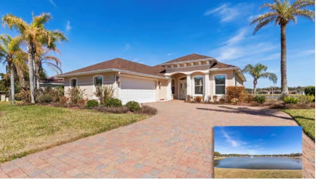 Photo of 154 Arena Lake Drive, Palm Coast, FL 32137 (MLS # FC316527)