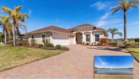 Photo of 154 Arena Lake Drive, Palm Coast, FL 32137 (MLS # FC316527)