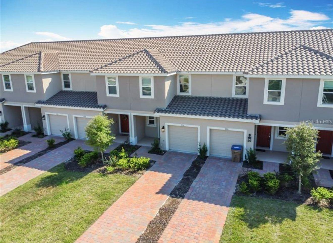 Stylish, convenient, and designed for comfort, this beautiful 3-bedroom, 2.5-bath townhome offers 1,373 sq. ft. of modern living with a one-car garage. Step onto the inviting front porch and into a bright, open layout featuring a spacious great room and a stylish kitchen with a large island—perfect for entertaining or enjoying quiet evenings at home. On the first floor, you’ll find a convenient half bath, direct garage access, and a large outdoor patio for relaxing or dining. Upstairs, the spacious owner’s suite with private bath is your personal retreat, joined by two additional bedrooms and another full bath. The upstairs laundry makes chores a breeze. With ample storage—including under-stair storage, a walk-in pantry, linen closet, and roomy bedroom closets—you’ll have space for everything.